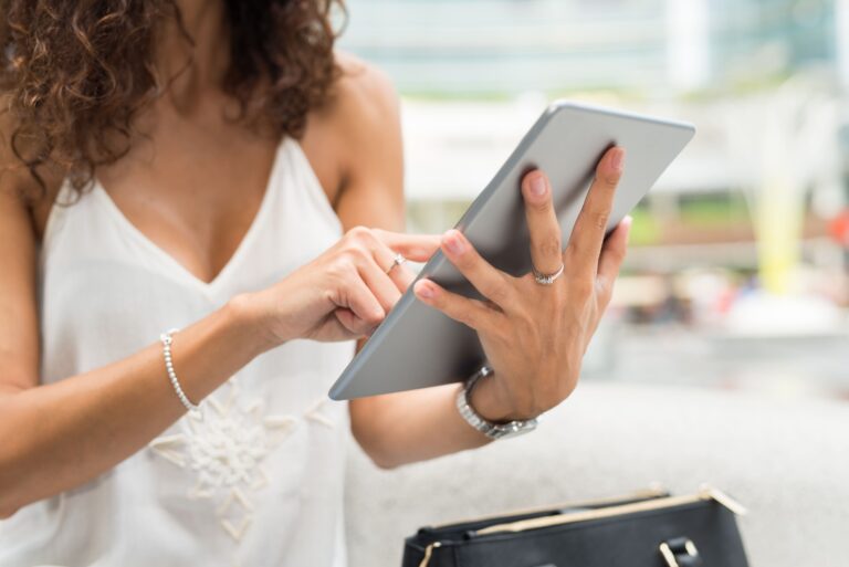 detail-woman-using-her-tablet