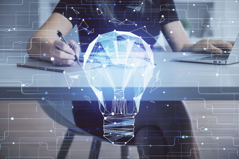 double-exposure-woman-hands-typing-computer-light-bulb-drawing-idea-concept